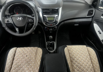 Подержанный автомобиль Hyundai Solaris Sedan 2011 года (11 фото)