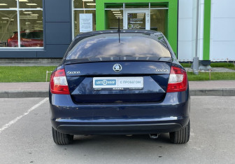 Подержанный автомобиль Skoda Rapid Liftback 2015 года (6 фото)