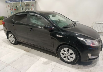 Подержанный автомобиль Kia Rio Sedan 2013 года (4 фото)