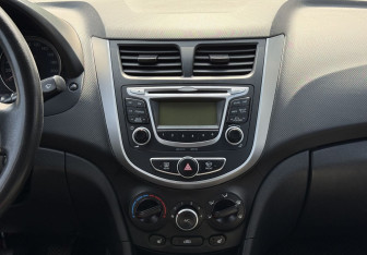 Подержанный автомобиль Hyundai Solaris Sedan 2013 года (14 фото)