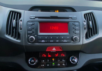 Подержанный автомобиль Kia Sportage 2010 года (14 фото)