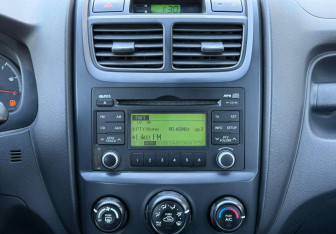 Подержанный автомобиль Kia Sportage 2009 года (13 фото)