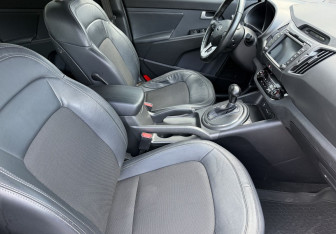 Подержанный автомобиль Kia Sportage 2013 года (10 фото)