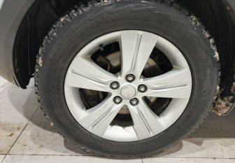 Подержанный автомобиль Kia Sportage 2011 года (9 фото)