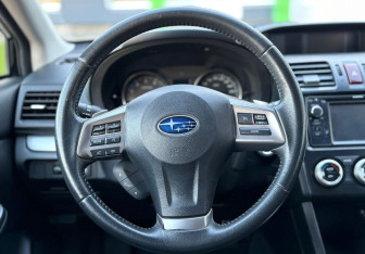 Подержанный автомобиль Subaru XV 2014 года (13 фото)