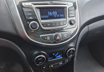 Подержанный автомобиль Hyundai Solaris Sedan 2014 года (14 фото)