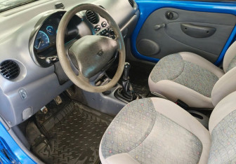 Подержанный автомобиль Daewoo Matiz 2013 года (9 фото)