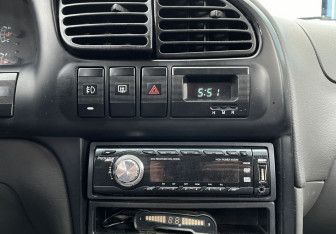 Подержанный автомобиль Kia Spectra Sedan 2006 года (13 фото)