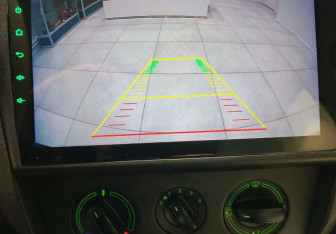 Подержанный автомобиль Skoda Rapid Liftback 2014 года (12 фото)