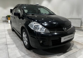 Подержанный автомобиль Nissan Tiida Hatchback 2013 года (3 фото)