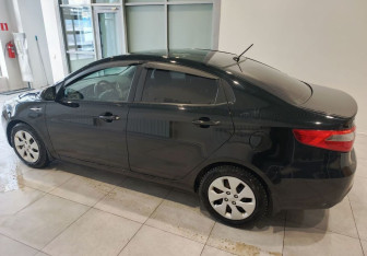 Подержанный автомобиль Kia Rio Sedan 2013 года (8 фото)