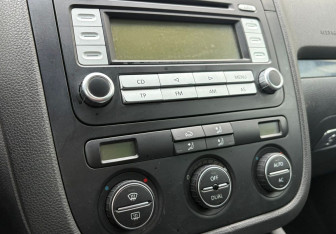 Подержанный автомобиль Volkswagen Golf Hatchback 2008 года (13 фото)