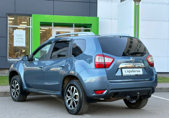 Подержанный автомобиль Nissan Terrano 2014 года (7 фото)