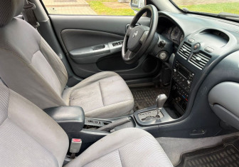 Подержанный автомобиль Nissan Almera Classic 2007 года (10 фото)