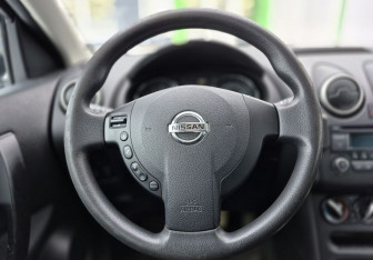 Подержанный автомобиль Nissan Qashqai 2013 года (13 фото)