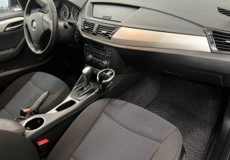 Подержанный автомобиль BMW X1 2012 года (12 фото)