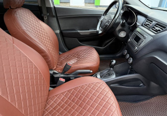 Подержанный автомобиль Kia Rio Sedan 2015 года (10 фото)