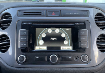 Подержанный автомобиль Volkswagen Tiguan 2011 года (13 фото)