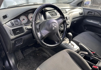 Подержанный автомобиль Mitsubishi Lancer Wagon 2007 года (9 фото)