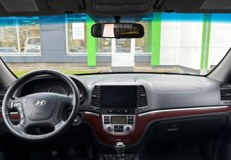 Подержанный автомобиль Hyundai Santa Fe 2009 года (9 фото)