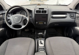 Подержанный автомобиль Kia Sportage 2009 года (9 фото)