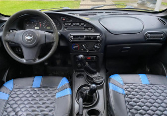 Подержанный автомобиль Chevrolet Niva 2010 года (9 фото)