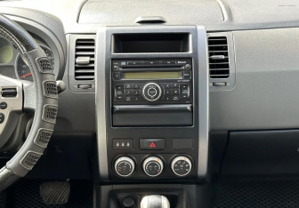 Подержанный автомобиль Nissan X-Trail 2008 года (13 фото)