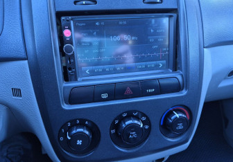 Подержанный автомобиль Kia Cerato Hatchback 2005 года (14 фото)