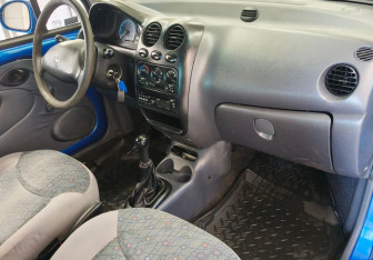 Подержанный автомобиль Daewoo Matiz 2013 года (11 фото)