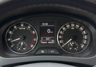 Подержанный автомобиль Skoda Rapid Liftback 2014 года (12 фото)