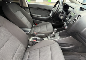 Подержанный автомобиль Kia Cerato Sedan 2013 года (10 фото)