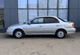 Подержанный автомобиль Kia Spectra Sedan 2008 года (7 фото)