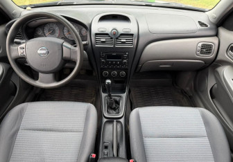Подержанный автомобиль Nissan Almera Classic 2011 года (9 фото)