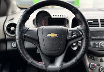 Подержанный автомобиль Chevrolet Aveo Sedan 2013 года (11 фото)