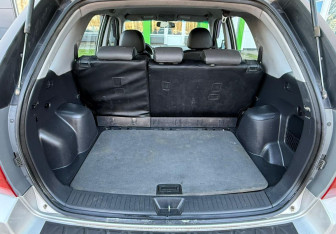 Подержанный автомобиль Kia Sportage 2009 года (15 фото)