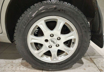 Подержанный автомобиль Chery Tiggo (T11) 2012 года (14 фото)