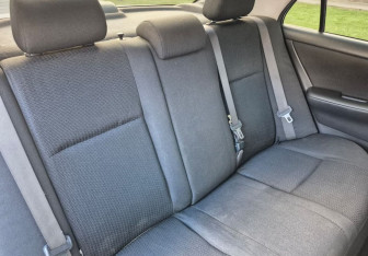 Подержанный автомобиль Toyota Corolla Sedan 2005 года (11 фото)