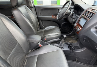 Подержанный автомобиль Kia Sportage 2006 года (10 фото)