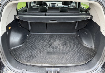 Подержанный автомобиль Kia Sportage 2013 года (17 фото)