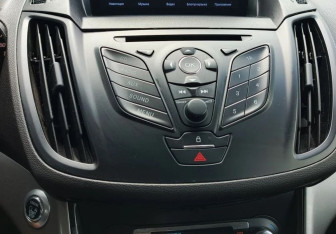 Подержанный автомобиль Ford Kuga 2014 года (13 фото)