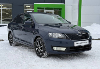 Подержанный автомобиль Skoda Rapid Liftback 2014 года (3 фото)