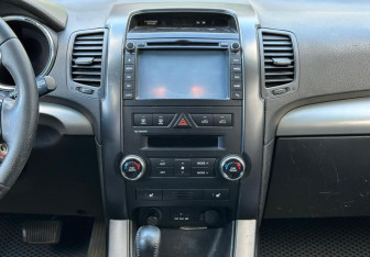 Подержанный автомобиль Kia Sorento 2012 года (13 фото)