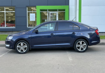 Подержанный автомобиль Skoda Rapid Liftback 2015 года (8 фото)