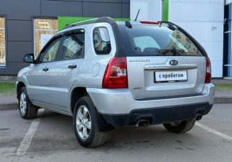 Подержанный автомобиль Kia Sportage 2009 года (7 фото)